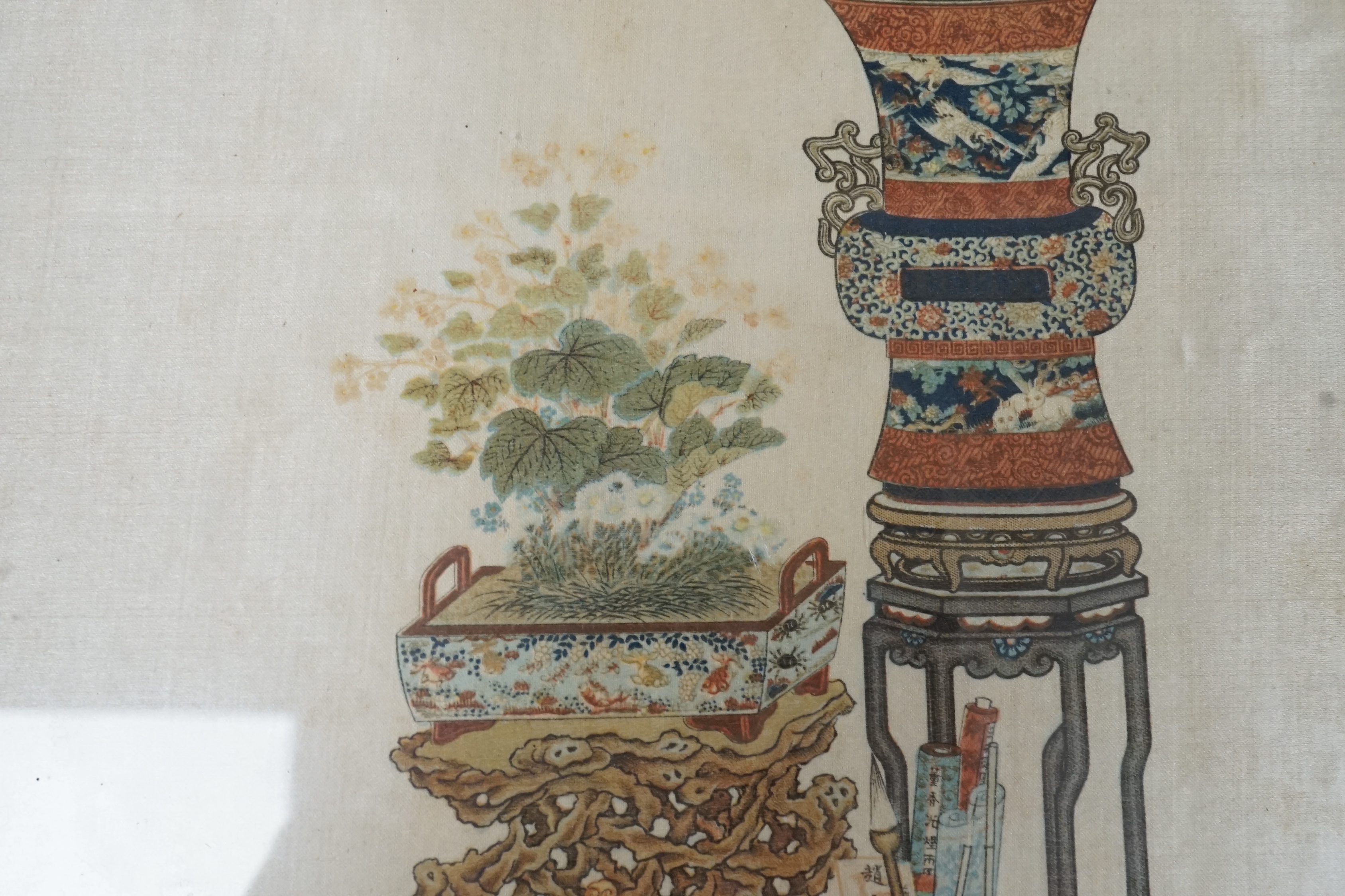 A Chinese print on silk of a plant stand and jardiniere. 28 x 24cm